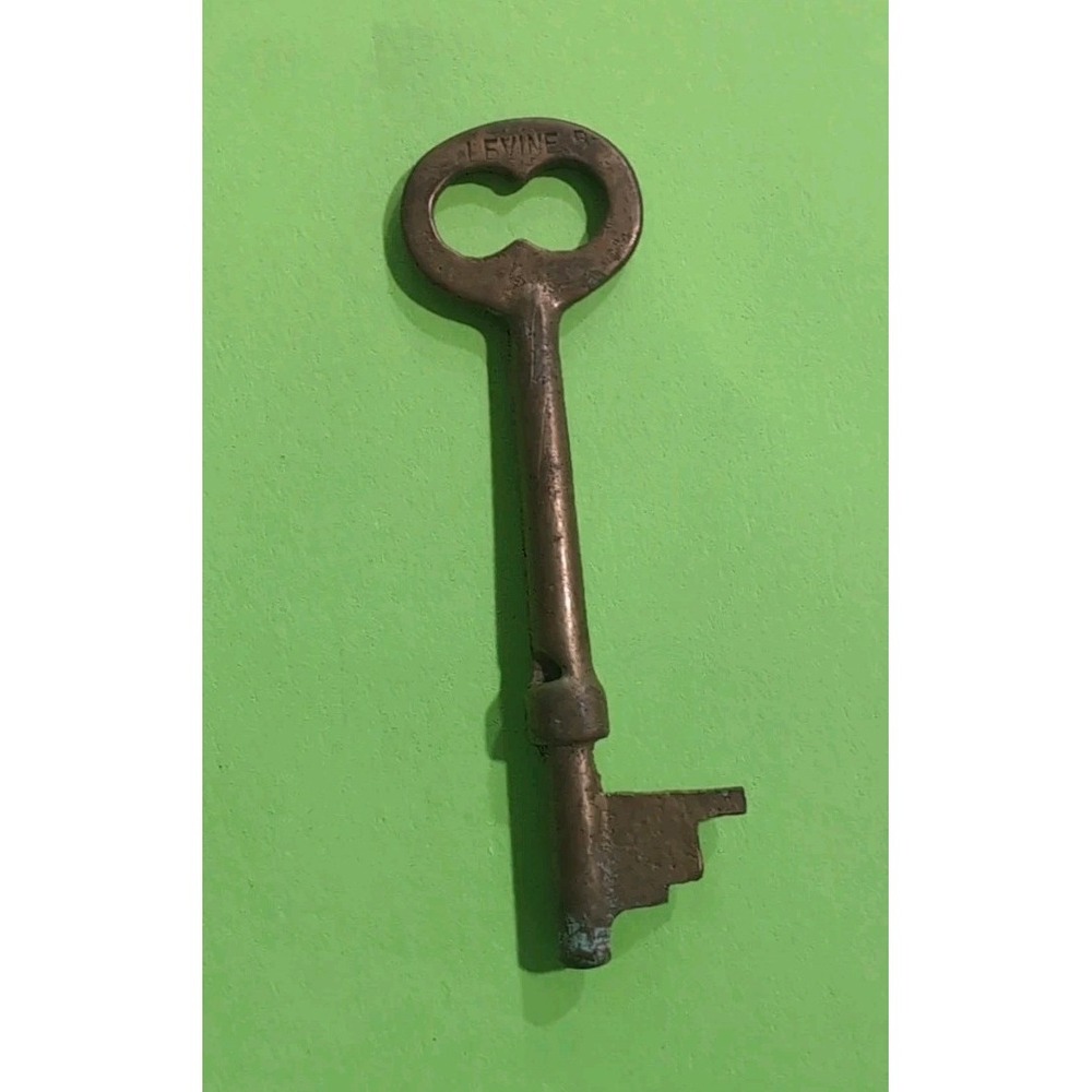 Vintage Long Levine Brass Solid Barrel Cabinet Skeleton Key